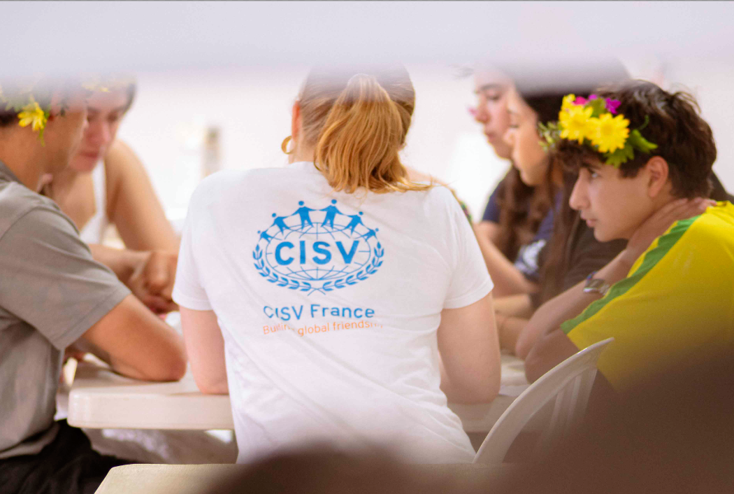 Director guiding a diverse team in programme planning